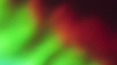 Bulanık parlaklık ışığı. Psikedelik renkler. Odaksız sızıntı. Sarı ışınlar. Gökkuşağı. Soyut sanat arka planında ışık yansıması..