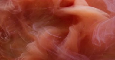 Duman dalgası. Boya dumanı. Pürüzsüz suluboya bukleler suda karışıyor. Soyut akış odaklanmış bulanık dokuya sahip gizemli renk arkaplanı.