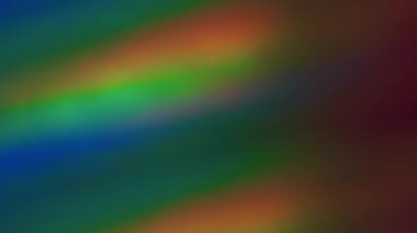 Bulanık detaylar. Sanal folyo. Odaksız sızıntı. Çok renkli yeşil ışınlar. Gökkuşağı, soyut sanat ışığı arka planında yanıp sönen ışın mercekleri..