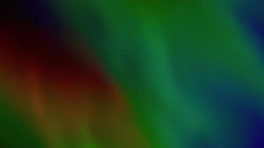 Soyut holografik doku. Bulanık parlayan yüzey. Odaklanmamış toz sızıntısı, çok renkli yeşil ışınlar, gökkuşağı gradyan titreşimler, sanat ışığı arka planında ışıldayan lensler..