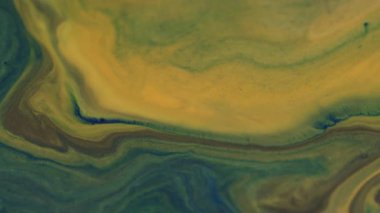 Yağ karışımı. Dökül bakalım. Sarı mavi renkli akarsular soyut sanat eserleri üzerinde yüzen parıldayan sıvı akışı bulanık bokeh ışık arkaplanı.