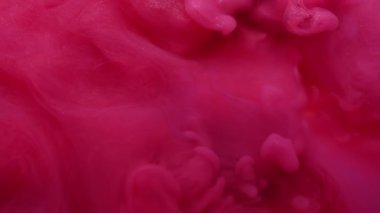 Duman sıvısı. Pembe dalga. Parlak su mürekkebi renk akışı fantazisi ıslak doku. Bulanık parlak, parlak kırmızı boya karışımı soyut arkaplan.