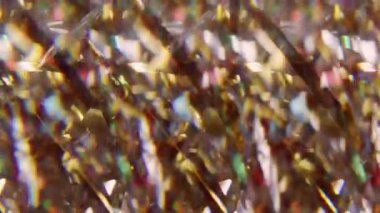 Bulanık renkli konfeti. Lüks ışık. Parlak sarı parçacıklar yanıp sönen kıvrımlar soyut şenlik sanatının arka planında hareket ediyorlar..