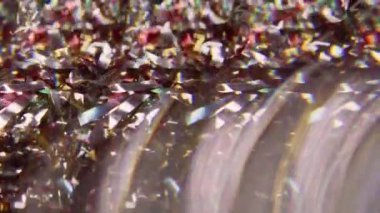 Bulanık soyut akış. Harika bir dönüş. Çok renkli, ışıl ışıl yeşil parçacıklar. Işıl ışıl mercek alevi. Sanat Bokeh hafif modern arka plan..