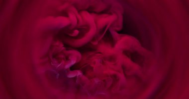 Duman patlaması. Mistik boya. Kırmızı mor dalga fantezi dalgası suda akıyor. Odaklanmamış parlak renk yuvarlak çerçeve lensi soyut arkaplan.