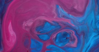 Enamel sıçradı. Akış boyası. Soyut yaratıcı arka planda hareket eden akrilik desen parçacıkları karıştırılmış mavi renkli renk dalgalanması.