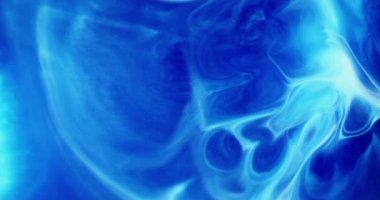 Dalgalanma arka planı. Mermer sıçraması. Kimyasal suda bulanık beyaz boya akrilik soyutlama üzerinde hareket eden parlak parçacıklar..