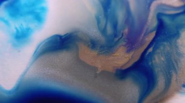 Mermer dokusu. Köpüklü sıvı. Soyut sanat arka planında yüzen su parıltılı sıvı akışında çözünmüş mavi sarı renk boya.