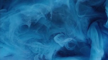 Parlak bir yapı. Boya akışı. Odaklanamayan mavi renkli parıldayan parçacıklar akrilik mürekkep suyu mermer karışımı dalga hareketini soyut sanat arkaplanı.