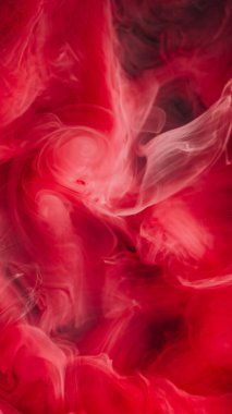 Duman girdabı. Mürekkep döküldü. Kırmızı spiral girdap fırtına akışı sanat renk sıvısı. Buhar akışını harmanla soyut doku parlak odaklanmış arkaplan.