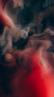 Sis dalgası. Buhar karışımı. Arka planda kırmızı siyah bulut akışı karışımı. Fantezi sihirli duman akrilik mürekkep pigmentini suya döker..