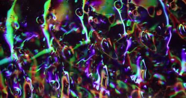 Parlak sanat. Odaklanmamış yansıma flaşı. Pırıl pırıl yeşil mor sarı renkli mercek soyut ışık modern arkaplanı açıyor..