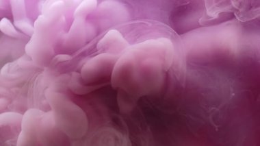 Duman arka planı. Sanat mürekkebi. Odaklanmamış pembe renk boya sıvı duman dokusu sıvı akışı ruhani soyut su üzerinde hareket ediyor..
