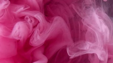 Pırıltılı sis. Mürekkep suyu karışımı. Pembe renk parıldayan parçacıklar dokusu duman sıçrayan dalgalar yüzen soyut sanat arkaplanı.