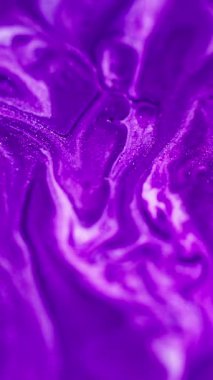 Dikey video. Boya karışımı. Akrilik sim akışı. Odaklanmamış neon beyaz renk parıldayan parçacıklar mermer desen mürekkep dökülmesi soyut sanat arka planı.