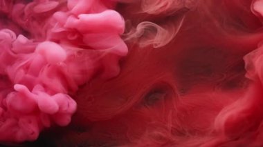 Su altı patlaması. Boya suyu sıçraması. Soyut sanat arka planında pembeleşmiş kırmızı duman dokusu akışı.