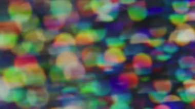 Fantezi parıltısı. Bulanık retro gerçekçi. Odaklanamayan sızıntı, çok renkli yeşil ışınlar, gökkuşağı, parlak ışıltı mercekleri, soyut sanat arkaplanda yanıp sönüyor..