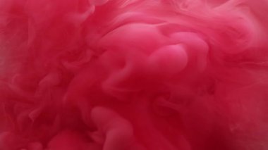 Buhar yüzüyor. Toz dokusu. Odaklanmamış kırmızı boya, su ruhani sıvıya sıçrıyor. Soyut sanat eserlerinin yaratıcı arka planında ilerliyor..