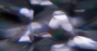 Işık kırılması. Görüntü pırıltısı. Odaklanmamış mavi turuncu renkli parıltılı kaleydoskop soyut sanat arka planında yüzüyor..