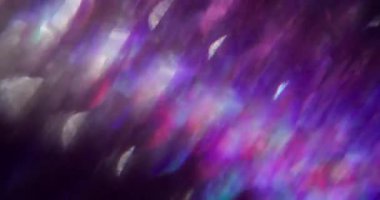 Lens fişeği. Odaklanamayan şenlik kaleydoskopu. Çok renkli, mor, yeşil, mavi, parıltılı, parıltılı, soyut, bokeh ışık arkaplanı..