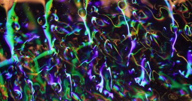 Parlayan parçacıklar. Renksiz titreşimli. Parlak, şeffaf, aydınlık, aydınlık, modern arka planda parıldayan mercek hareketi..