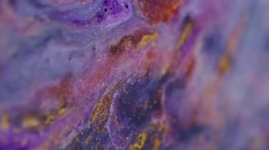 Görüntü parlıyor. Parlak sıvı karışımı. Odaklanamayan mor ışıltılı ışıldayan parlak mermer desen parlak parçacıklar soyut bokeh ışık sanat arka planında hareket ediyorlar.