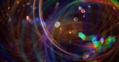 Sihirli Noel. Odaklanmış ışık fişekleri. Parlak yeşil renk parçacıkları Bokeh efektli bulanık arkaplan üzerinde lens flaş hareketi.