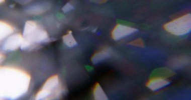 Renk parıltısı. Bulanık kıvılcım dokusu. Soyut sanat arka planında sönük mavi turuncu optik parıltı yanıp sönüyor..