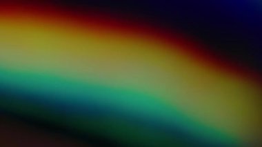 Gökkuşağı renkleri. Bulanık ışık yayılıyor. Odaksız sızıntı yeşil ışınlar titreşimler ışık demeti çizgileri mercek parlamaları soyut sanat arka planında.