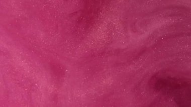 Parıltı buharı. Boya rengi bulutu. Soyut sanat ışığı arka planında parlayan parlak sıvı ışıldayan pembe sisli mürekkep dokusu.