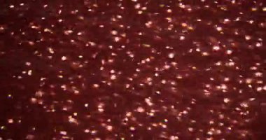 Parlak doku. Parlak arka plan bulanıklığı. Parlayan kırmızı kırmızı renkli mercek yanıp sönen modern sanat soyut parlayan ışık..