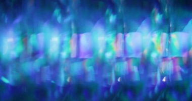 Işın sızıntısı. Odaklanamayan renkli işaret fişeği. Işık sanatının parlak arka planında soyut bulanık parlak mavi yansıma.