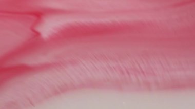 Mermer karışımı. Mürekkep damlası. Soyut sanat arka planında akan su kimyasal dalgalı diş minesi sıvısına odaklanmış kırmızı beyaz renk..