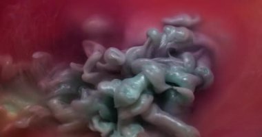 Sis dokusu. Mürekkep suyu. Odaklanmamış pembe renk duman kimyasal madde sıvı dalga sıvısı soyut sanat arka planında hareket ediyor.