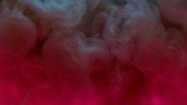 Mürekkep karışımı. Sis girdabı. Kırmızı gri pigment fantezi şekil dalga sualtı karışımı dökülüyor. Parlayan neon çözünmüş sanat soyut su arkaplanı.