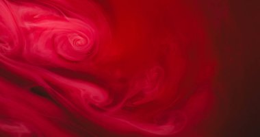 Parlak sis. Boya akışı. Bulanık kırmızı, kırmızı, kırmızı, akrilik, pırıl pırıl sisli, soyut arka planda dalgalanan sisli sıvı..