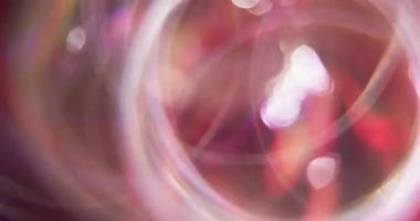 Dönen daire. Bulanık, parlak. Bokeh hafif kaleydoskop modern arkaplan üzerinde çok renkli mercek parıltısı hareketi.