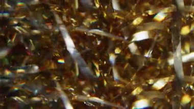 Görüntü tatil sanatı. Parlak ışık. Parlayan altın sarısı çok renkli partiküller soyut arkaplanda hareket eden parlak mercek parlamaları.