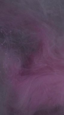 Dikey video. Pamuk şeker. Sisli bir gökyüzü. Yumuşak yumuşak renk, tatlı diş ipi dokusu. Modern sanatın soyut arka planında pembe beyaz trend.