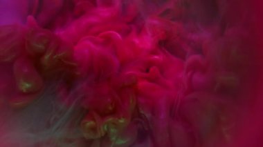 Mürekkep. Renk patlaması. Sualtı sanatı pırıl pırıl neon patlaması. Boya dumanı kırmızı mor menekşe bulanık karışımı lekeli damla soyut arkaplan.