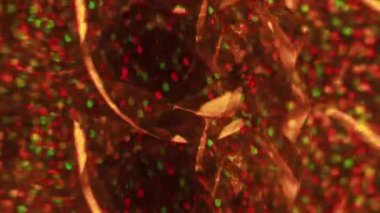 Bulanık konfeti. Parıldayan pırıltı. Işıl ışıl sarı çok renkli parlak noktalar soyut arkaplanı çalıştıran parlak parçacıklar.