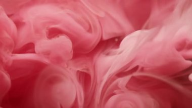 Duman sıçrıyor. Duman karışımı. Pembe sıvı boya pigment dalga karışımı renk soyut arkaplan. Su dokusu girdap bulanıklığı damla damlası boya akışı.
