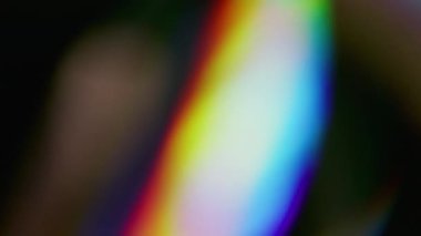 Işın sızıntısı. Bulanık ışık soyut. Odaklanmamış turuncu mavi renk spektrumu parıltı desen gökkuşağı kıvılcımı sanatın koyu siyah arka planında.