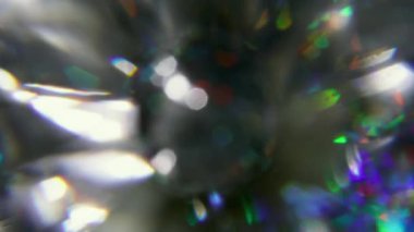 Top parıldıyor. Görüntü pırıltısı sanatı. Odaklanmamış yuvarlak şekil parıltısı mercek gökkuşağı daire spektrumu parlaklığı soyut ışık arkaplanı üzerinde titreşir.