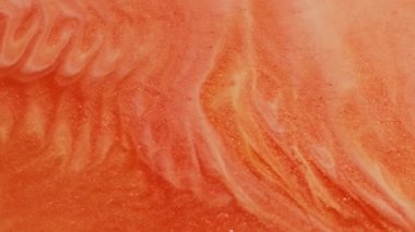 Mürekkep yayıldı. Boya karışımı. Parlak renkli boya akışı fantezi dokusu. Sıcak akrilik lav soyut dalga hareketi arka planı bulanıklaştırır.