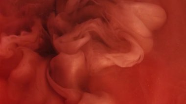 Duman dalgası. Boyayla boyanmış. Suluboya damlası mürekkep karışımını renk suyuna döker. Sarı turuncu gölge sanat eseri nem dokusu soyut arkaplan bulanıklığı.