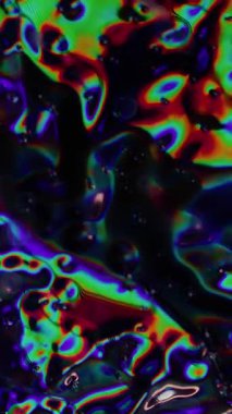 Dikey video. Psikedelik ışıltı. Bulanık bir doku. Odaklanamayan sızıntı, çok renkli yeşil ışınlar, gökkuşağı titreşimleri, ışık arka planında ışık yansıması..