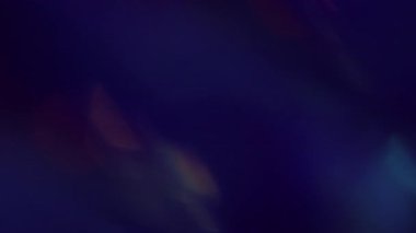 Işıl ışıl. Bulanık mercek. Modern optik koyu siyah arkaplan üzerinde sönük yeşil, altın parıltılı parlak ışık dokusu.