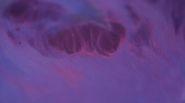 Karışık pırıltı. Odaklanamayan ışıl ışıl renk. Yanıp sönen mor renk sıvı bulanık modern bokeh ışık arkaplanını açıyor.