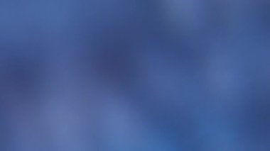 Ray parlak. Bulanık işaret fişeği. Odaklanmamış mavi renkli kıvılcımlar desen mercek yanıp sönen ışık soyut sanat arka planında yüzüyor..